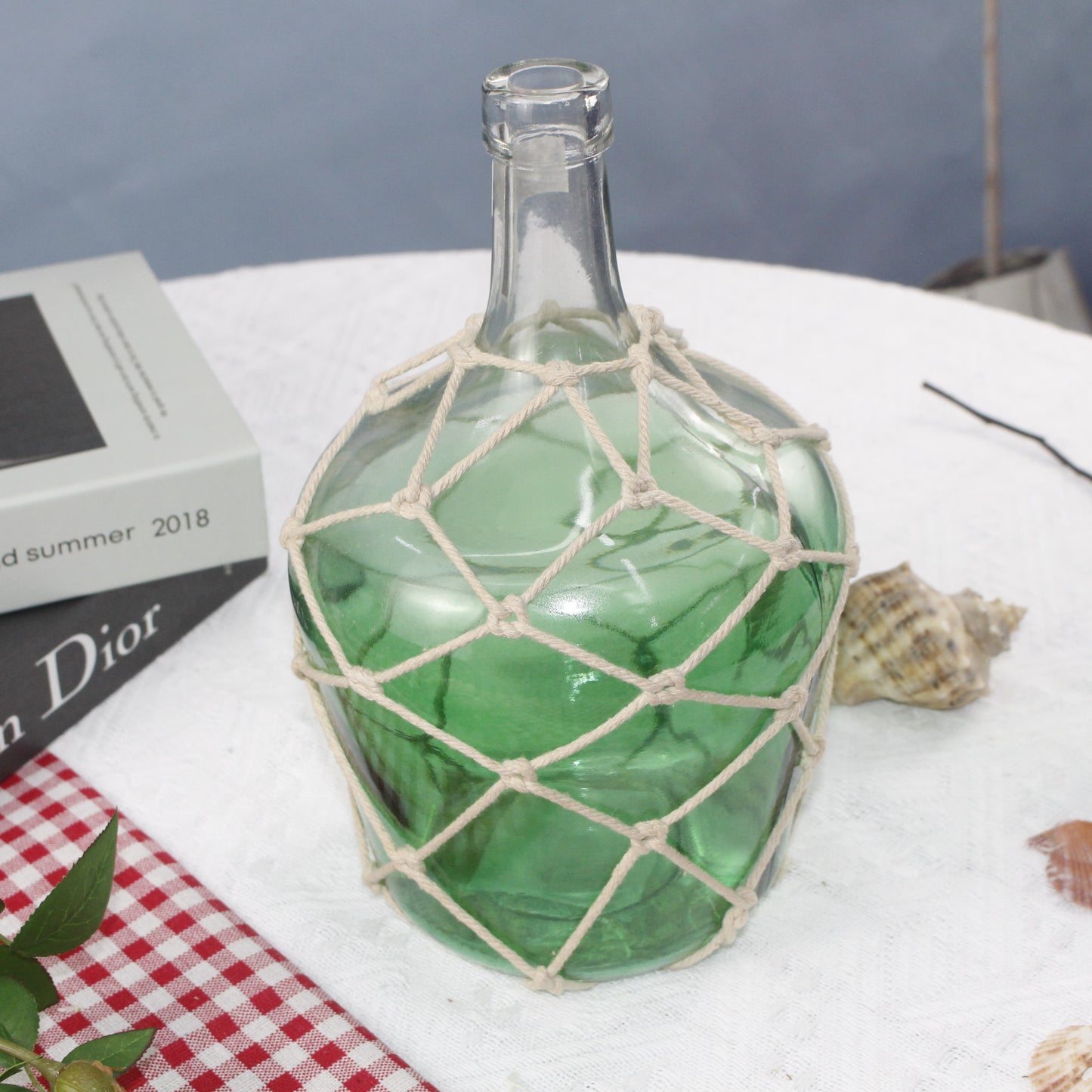 2024 wholesale vintage handmade wicker rattan wrap woven glass bottle with rattan handle